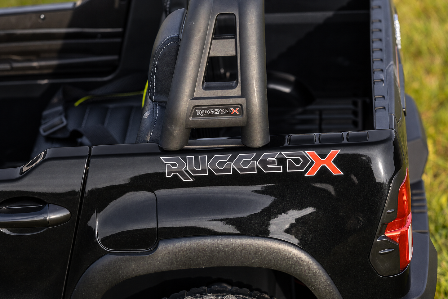 Licensed Toyota Hilux in Black RuggedX Two Seat Ride On Jeep