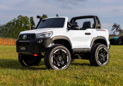 Licensed Toyota Hilux in White RuggedX Two Seat Ride On Jeep